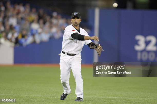 Alex Gonzalez of the Toronto Blue Jays fields the ball during the game against the Chicago White Sox at the Rogers Centre on April 12, 2010 in...