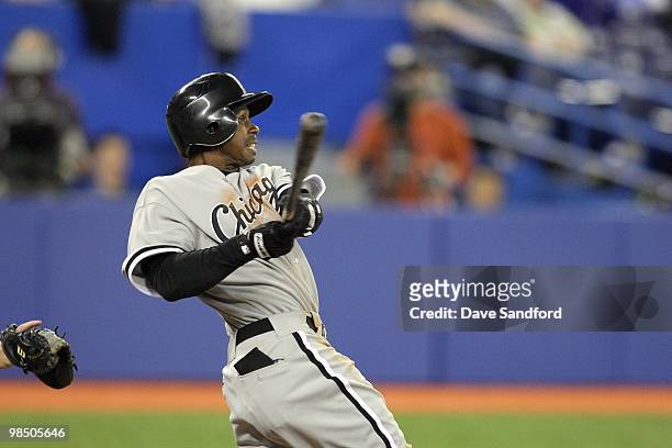 Juan Pierre of the Chicago White Sox makes a hit against the Toronto Blue Jays during their MLB game at the Rogers Centre on April 12, 2010 in...