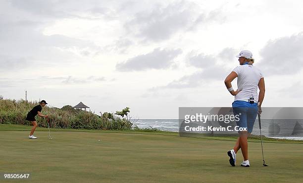 Anna Nordqvist of Sweden watches as Amanda Blumenherst of the United States lines up her putt on the sixth green during the final match of The Mojo 6...