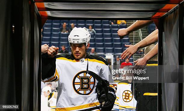 Andrew Ference of the Boston Bruins is greeted by fans before their game against the Buffalo Sabres in Game One of the Eastern Conference...