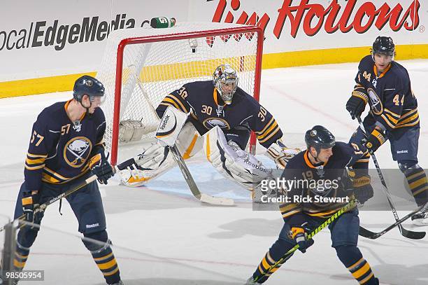 Tyler Myers, Ryan Miller, Tim Connolly and Andrej Sekera of the Buffalo Sabres defend against the Boston Bruins in Game One of the Eastern Conference...