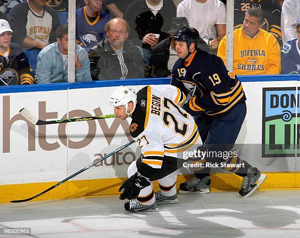 Steve Begin of the Boston Bruins skates against Tim Connolly of the Buffalo Sabres in Game One of the Eastern Conference Quarterfinals during the...