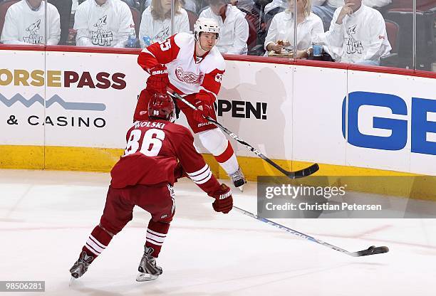 Niklas Kronwall of the Detroit Red Wings passes the puck in Game One of the Western Conference Quarterfinals against the Phoenix Coyotes during the...