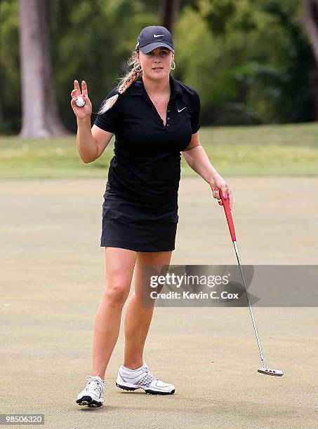 Amanda Blumenherst of the United States reacts after her putt on the third green during the final match of The Mojo 6 Jamaica LPGA Invitational at...