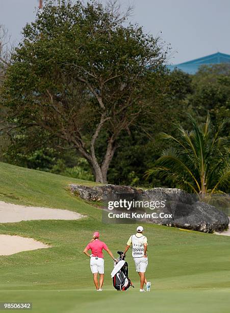 Suzann Pettersen of Norway waits for her second shot from the second fairway during the quarterfinals of The Mojo 6 Jamaica LPGA Invitational at...