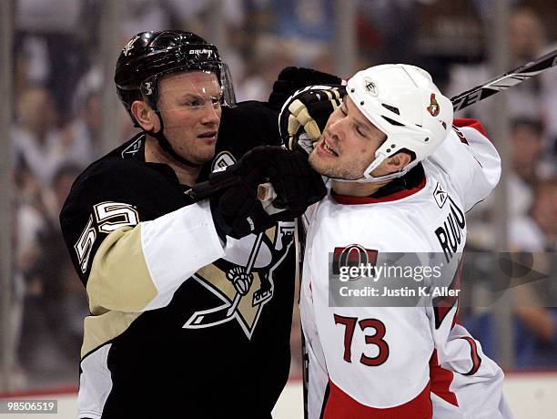 Sergei Gonchar of the Pittsburgh Penguins and Jarkko Ruutu of the Ottawa Senators mix it up in Game Two of the Eastern Conference Quarterfinals...