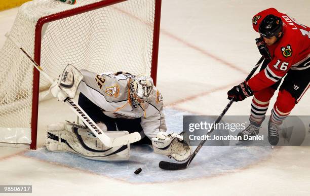 Pekka Rinne of the Nashville Predators stops a shot by Andrew Ladd of the Chicago Blackhawks in Game One of the Western Conference Quarterfinals...