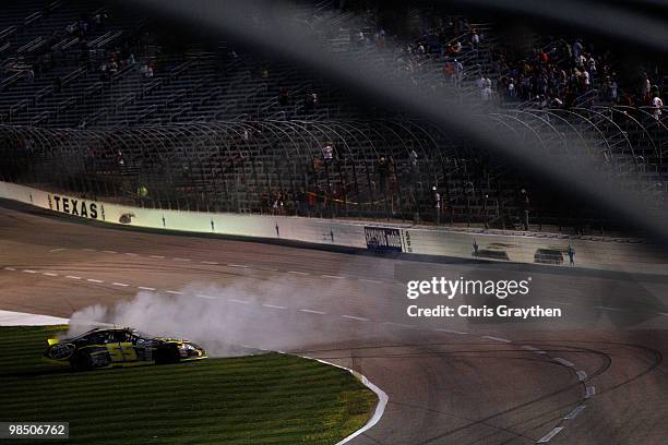 Steve Arpin, driver of the Fort Frances Ontario, performs a burnout after winning the ARCA Racing Series Rattlesnake 150 at Texas Motor Speedway on...