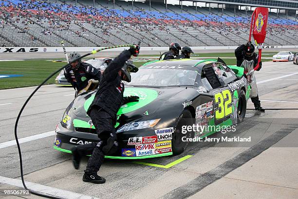 Justin Marks, driver of the Construct Corps Toyota, makes a pit stop during the ARCA Racing Series Rattlesnake 150 at Texas Motor Speedway on April...