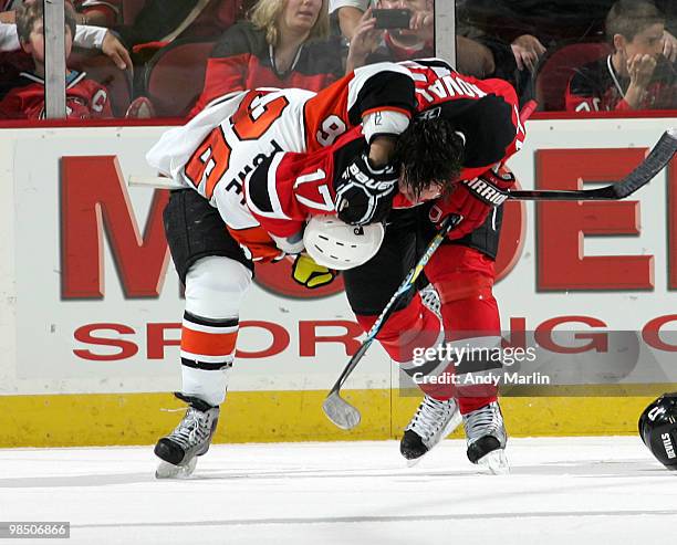 Darroll Powe of the Philadelphia Flyers and Ilya Kovalchuk of the New Jersey Devils tangle up in Game Two of the Eastern Conference Quarterfinals...