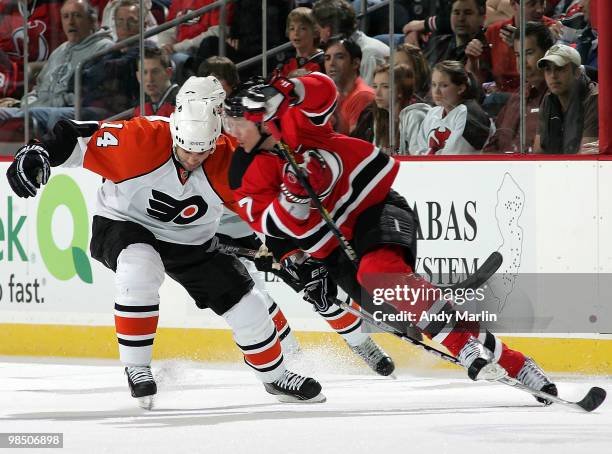 Ian Laperriere of the Philadelphia Flyers and Paul Martin of the New Jersey Devils battle hard for position in Game Two of the Eastern Conference...