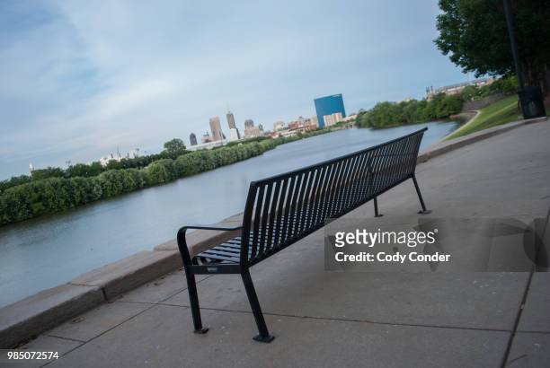 bench near downtown indianapolis - indianapolis sunset stock pictures, royalty-free photos & images