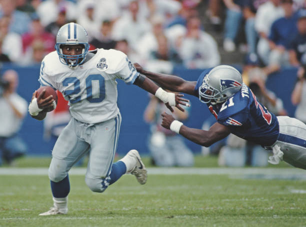 Barry Sanders, Running Back for the Detroit Lions runs the ball during the American Football Conference East game against the New England Patriots on...