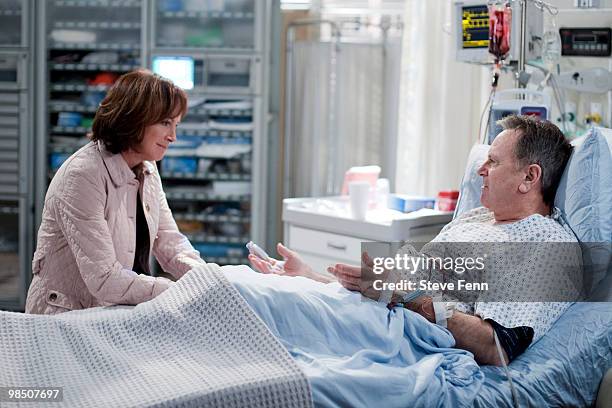 Hillary B. Smith and Robert S. Woods in a scene that airs the week of April 12, 2010 on Disney General Entertainment Content via Getty Images...