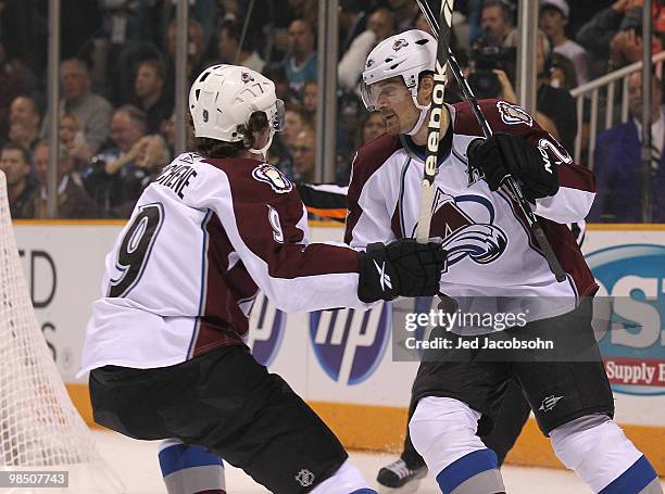 Milan Hejduk of the Colorado Avalanche celebrates with teammate Matt Duchene after scoring against the San Jose Sharks in Game Two of the Western...