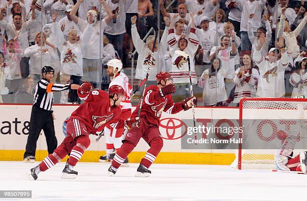 Petr Prucha and Radim Vrbata of the Phoenix Coyotes react after a goal against the Detroit Red Wings in Game Two of the Western Conference...