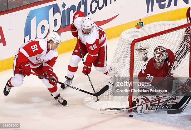 Valtteri Filppula of the Detroit Red Wings centers the puck past goaltender Ilya Bryzgalov of the Phoenix Coyotes in the first period of Game Two of...