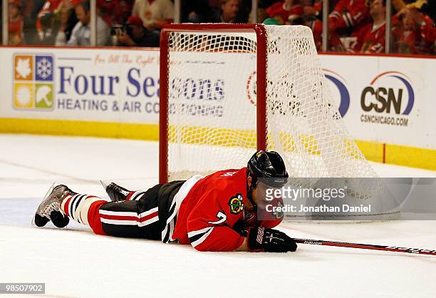 Brent Seabrook of the Chicago Blackhawks lays on the ice after the Nashville Predators scored an open net goal near the end of regulation time in...