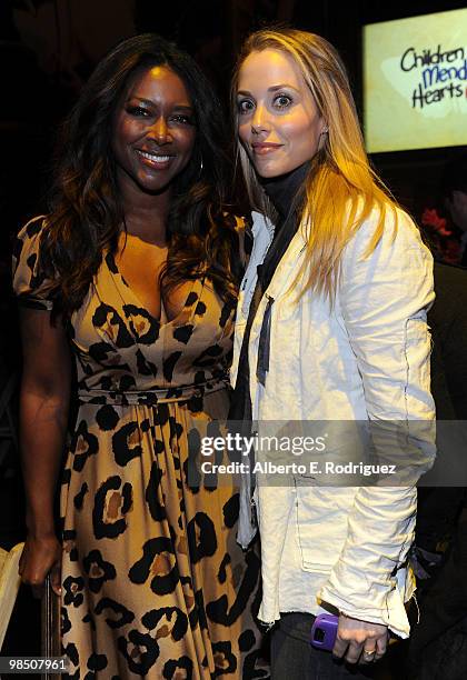 Actresses Kenya Moore and Elizabeth Berkley attend the Children Mending Hearts 3rd Annual "Peace Please" Gala held at The Music Box at the Fonda...