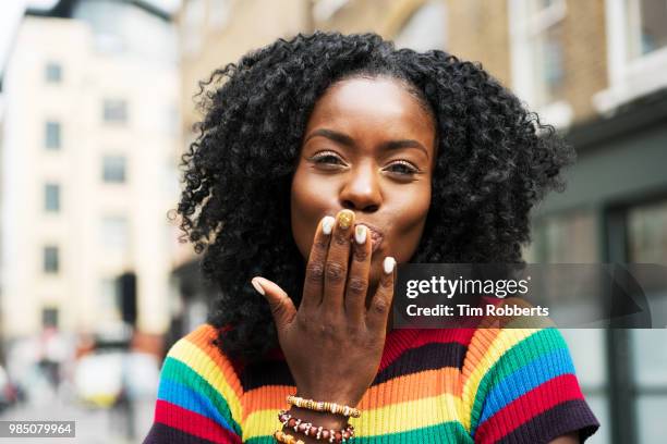 woman blowing kiss - manicura de diseño fotografías e imágenes de stock