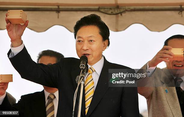 Japan's Prime Minister Yukio Hatoyama toasts during the annual cherry blossom viewing party on April 17, 2010 in Tokyo, Japan.