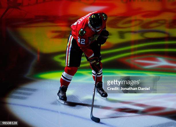 Kris Versteeg of the Chicago Blackhawks skates onto the ice during player introductions before Game One of the Western Conference Quarterfinals...