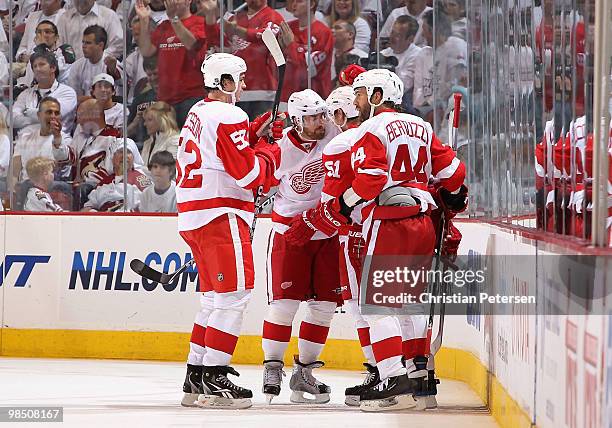 Jonathan Ericsson, Henrik Zetterberg, Valtteri Filppula and Todd Bertuzzi of the Detroit Red Wings celebrate after Valtteri Filppula scored a second...