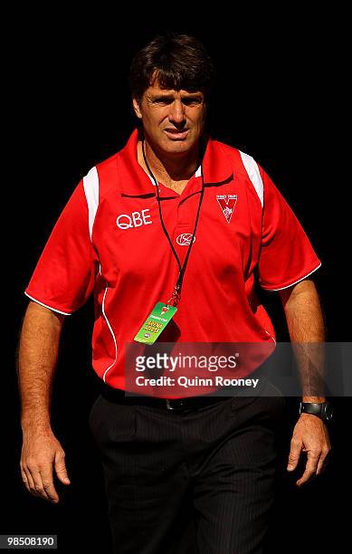 Swans coach Paul Roos walks out onto the ground before the round four AFL match between the North Melbourne Kangaroos and the Sydney Swans at Etihad...