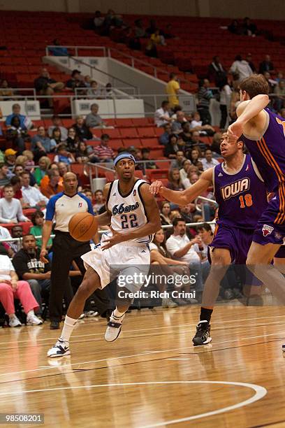 Mustafa Shakur of the Tulsa 66ers drives against Mark Tyndale of the Iowa Energy in NBA D-League second round playoff action at the Tulsa Convention...