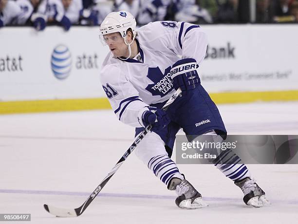 Phil Kessel of the Toronto Maple Leafs takes the puck against the Boston Bruins on March 4, 2010 at the TD Garden in Boston, Massachusetts. The...