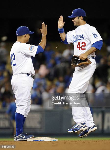 Andre Ethier of the Los Angeles Dodgers celebrates a victory with Rafael Furcal over the San Francisco Giants at Dodger Stadium on April 16, 2010 in...