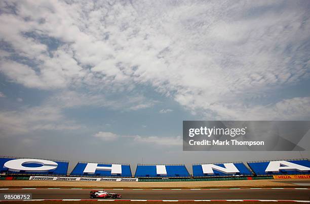 Jenson Button of Great Britain and McLaren Mercedes drives during the final practice session prior to qualifying for the Chinese Formula One Grand...