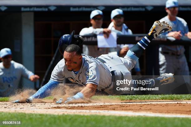 Carlos Gomez of the Tampa Bay Rays slides home to score on a single off the bat of Matt Duffy during the second inning of an MLB baseball game...