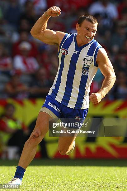 Brent Harvey of the Kangaroos celebrates kicking a goal during the round four AFL match between the North Melbourne Kangaroos and the Sydney Swans at...