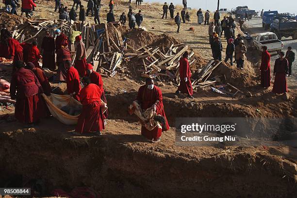 Tibetan monks prepare a mass cremation for the victims of a strong earthquake, on April 17 in Jiegu, near Golmud, China. Current reports state 1144...