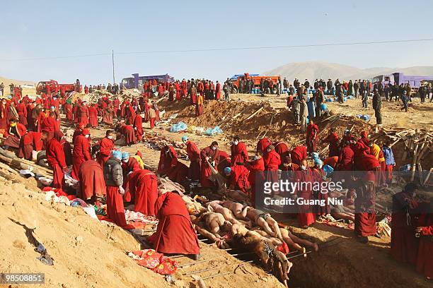 Tibetan monks prepare a mass cremation for the victims of a strong earthquake, on April 17 in Jiegu, near Golmud, China. Current reports state 1144...