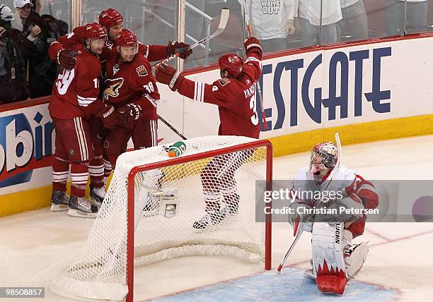 Shane Doan of the Phoenix Coyotes celebrates with teammates Vernon Fiddler, Taylor Pyatt and Keith Yandle after Doan scored a third period goal...