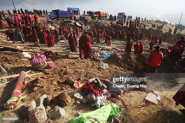 Tibetan monks prepare a mass cremation for the victims of a strong earthquake, on April 17 in Jiegu, near Golmud, China. Current reports state 1144...