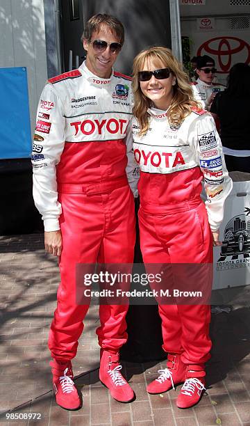 Professional skateboarder Tony Hawk and actress Megyn Price attend the 2010 Toyota Pro Celebrity Qualifying Race at the Grand Prix of Long Beach on...