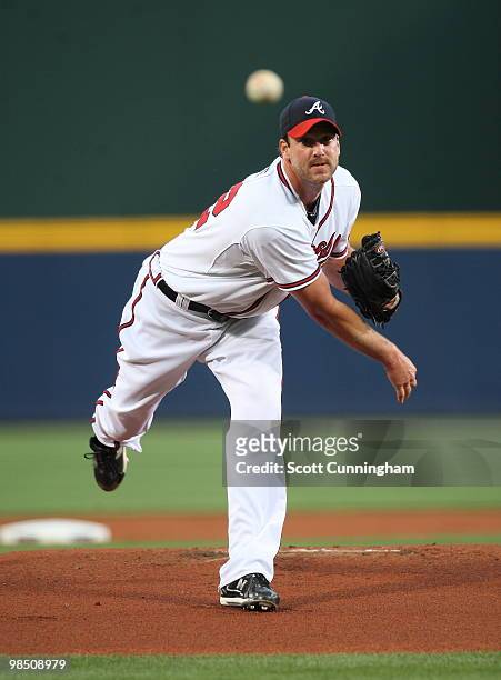 Derek Lowe of the Atlanta Braves pitches against the Colorado Rockies at Turner Field on April 16, 2010 in Atlanta, Georgia. The Braves defeated the...