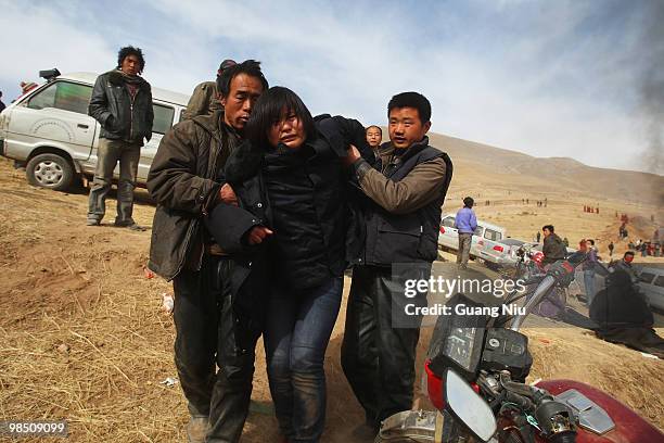 Tibetan monks prepare a mass cremation for the victims of a strong earthquake, on April 17 in Jiegu, near Golmud, China. Current reports state 1144...