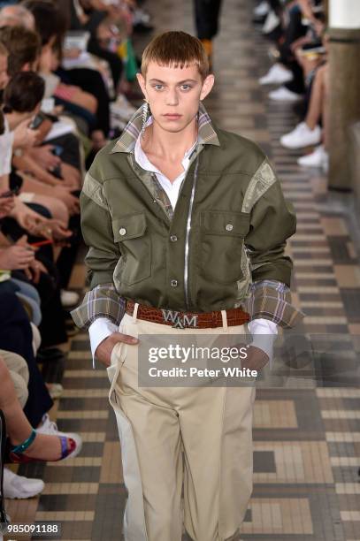 Model walks the runway during the Wooyoungmi Menswear Spring/Summer 2019 show as part of Paris Fashion Week on June 23, 2018 in Paris, France.