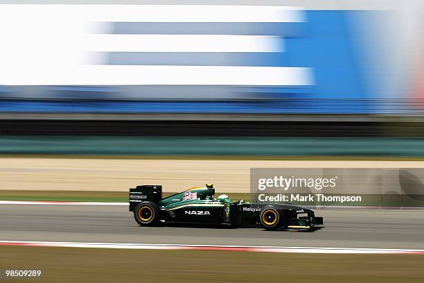 Heikki Kovalainen of Finland and Lotus drives during the final practice session prior to qualifying for the Chinese Formula One Grand Prix at the...