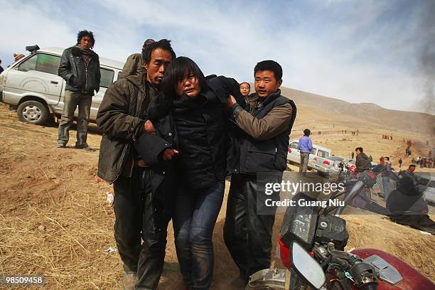 Tibetan monks prepare a mass cremation for the victims of a strong earthquake, on April 17 in Jiegu, near Golmud, China. Current reports state 1144...