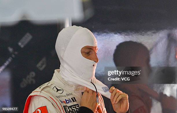 Jenson Button of Great Britain and McLaren Mercedes prepares to drive during practice for the Chinese Formula One Grand Prix at the Shanghai...