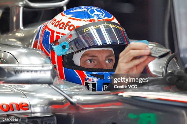 Jenson Button of Great Britain and McLaren Mercedes prepares to drive during practice for the Chinese Formula One Grand Prix at the Shanghai...