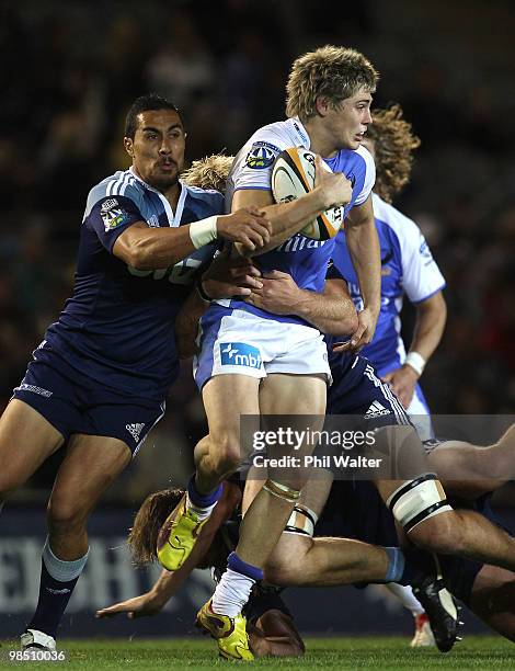 James O'Connor of the Force is tackled by Stephen Brett of the Blues during the round 10 Super 14 match between the Blues and the Western Force at...