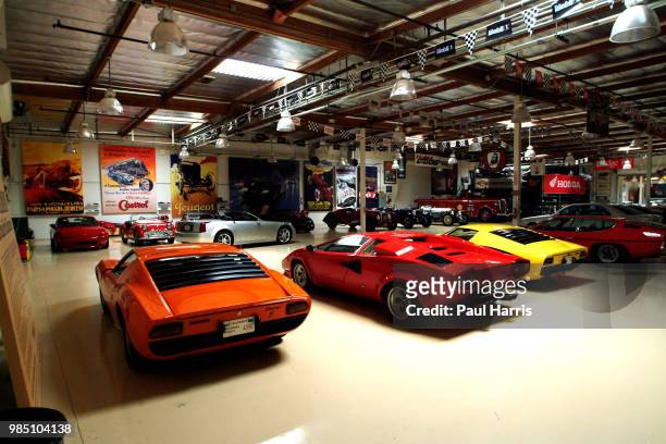 Just a few of the cars and Motor cycles in the 3 Air conditioned warehouse that store Jay Lenos collection of cars and motor cycles. American...
