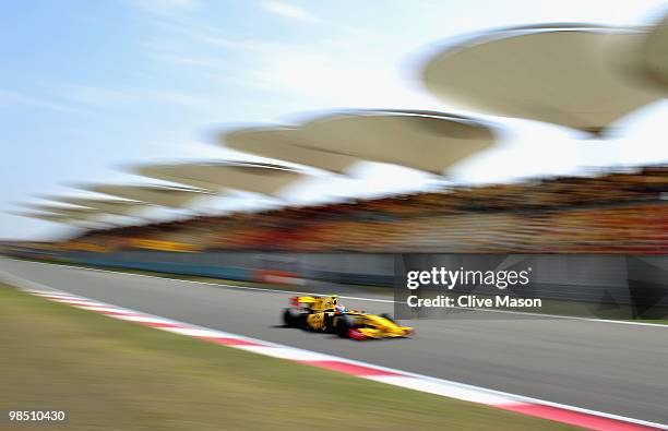 Vitaly Petrov of Russia and Renault drives during qualifying for the Chinese Formula One Grand Prix at the Shanghai International Circuit on April...