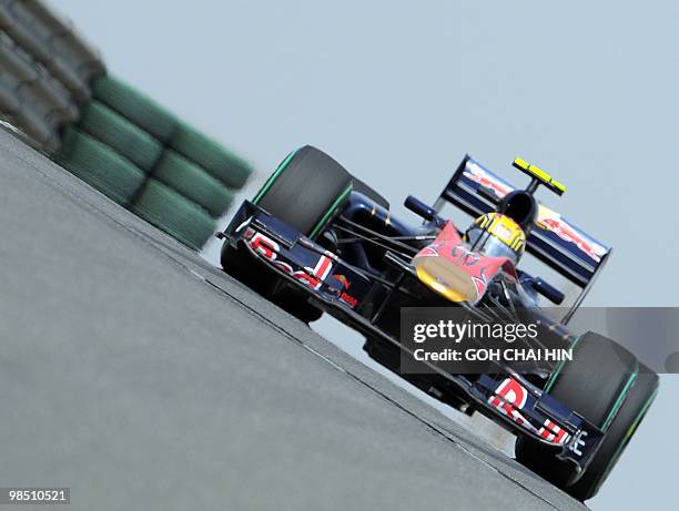 Red Bull-Renault driver Mark Webber of Australia drives his car during the final qualify session for Formula One's Chinese Grand Prix in Shanghai on...